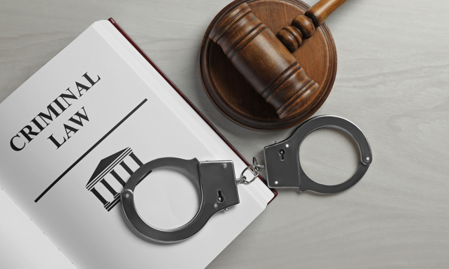 Judge's Gavel, Handcuffs And Criminal Law Book
