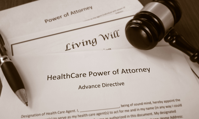 Healthcare Power of Attorney, Living Will documents with legal gavel